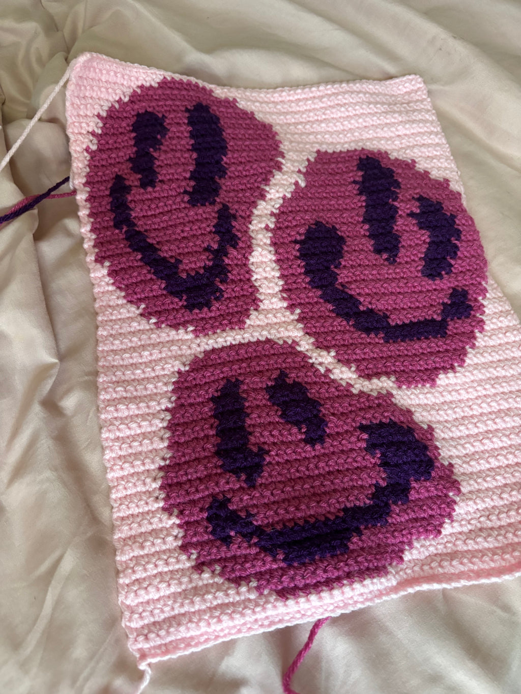 Smiley face tapestry
