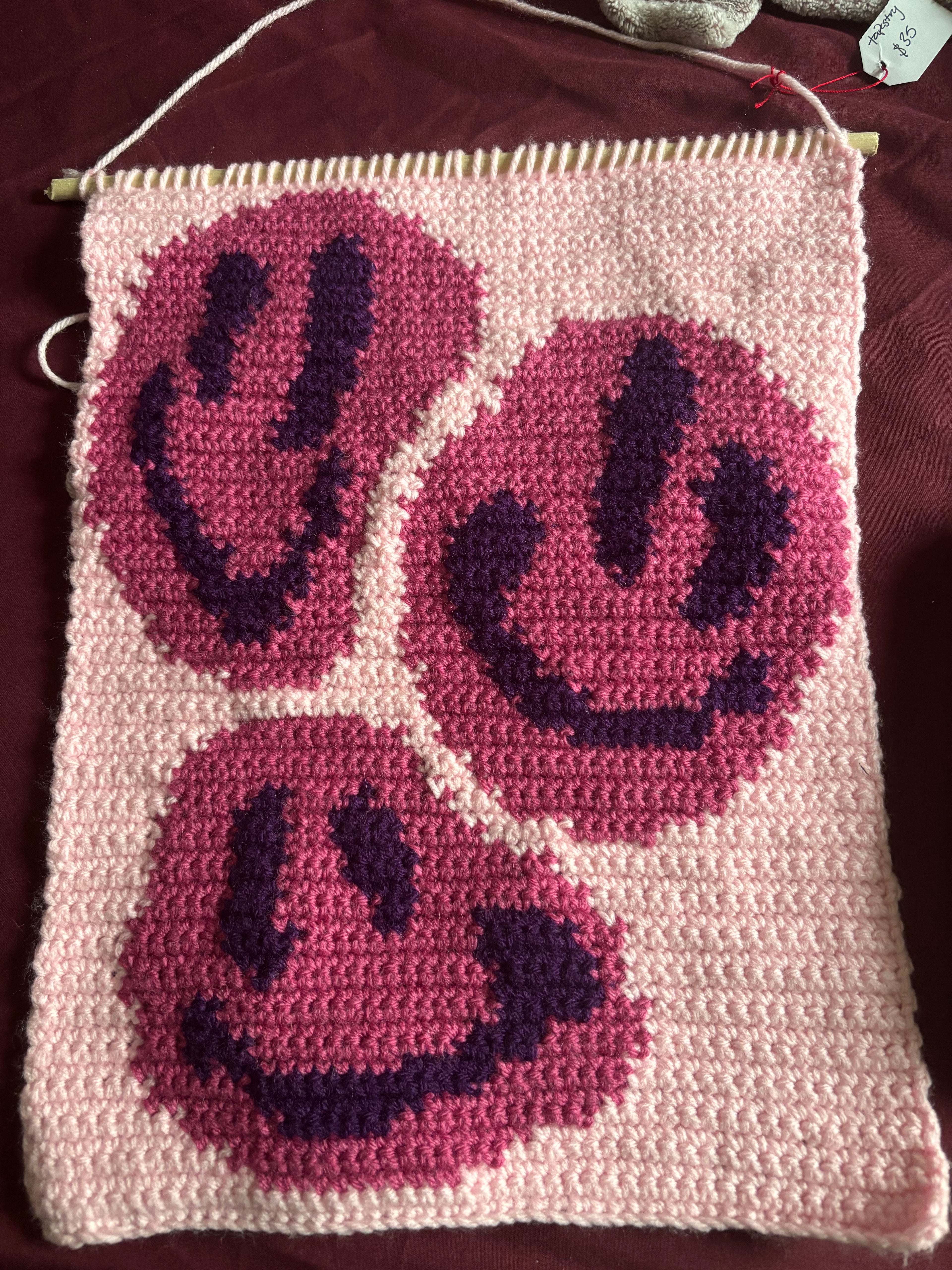 Smiley face tapestry