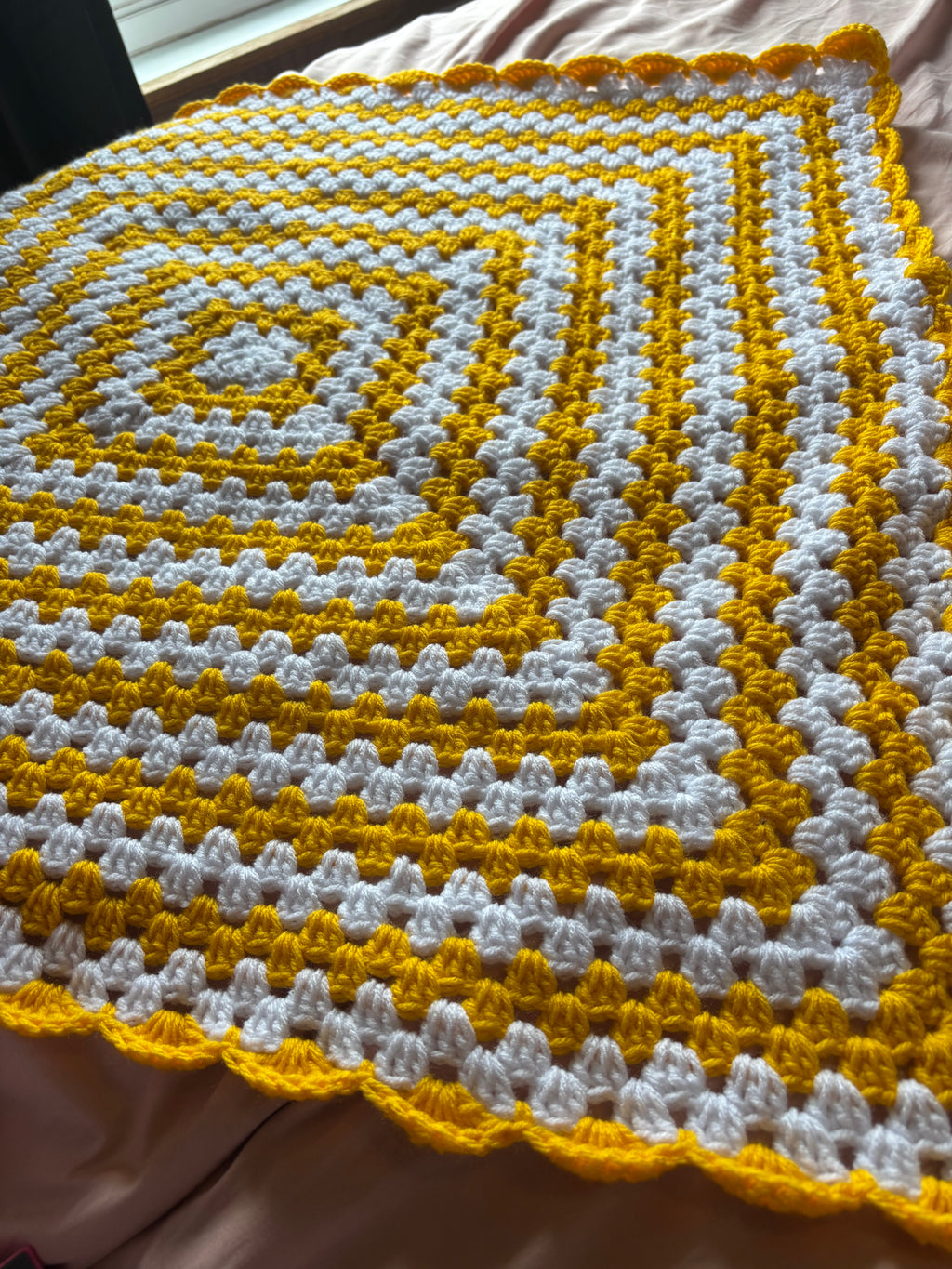 Yellow and white baby blanket